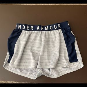 Under armour shorts size small. Never worn.